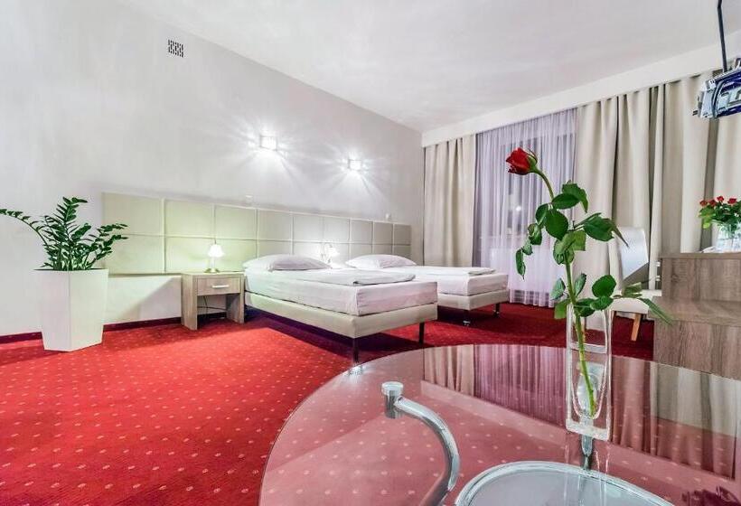 חדר דלוקס, Tm