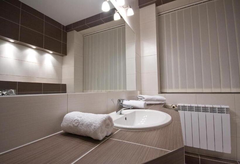 חדר דלוקס, Tm