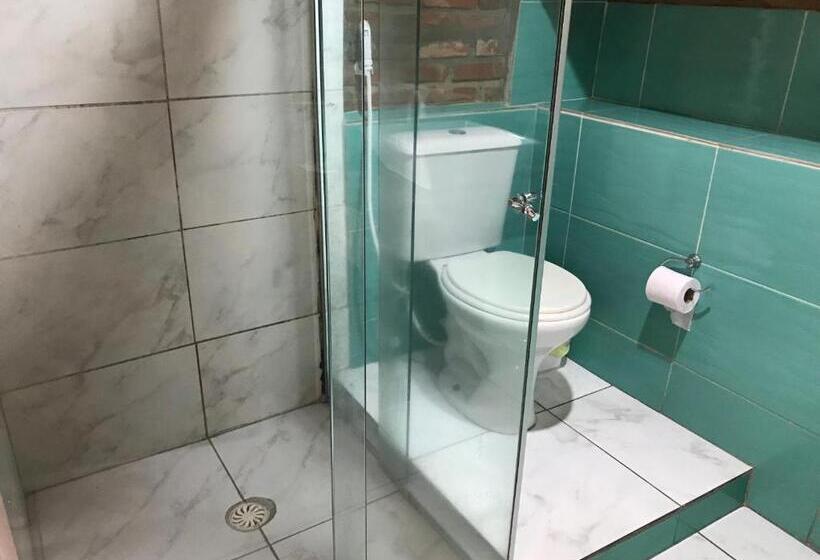 חדר לארבעה סטנדרטי עם נוף לגינה, Pousada Alto Astral