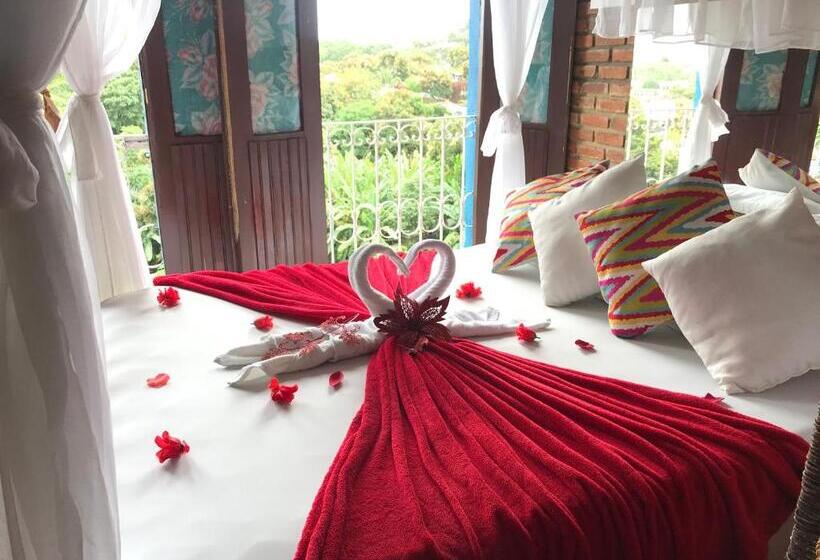 חדר לארבעה סטנדרטי עם נוף לגינה, Pousada Alto Astral