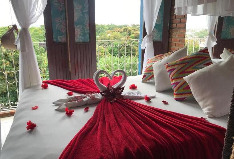 חדר לארבעה סטנדרטי עם נוף לגינה, Pousada Alto Astral