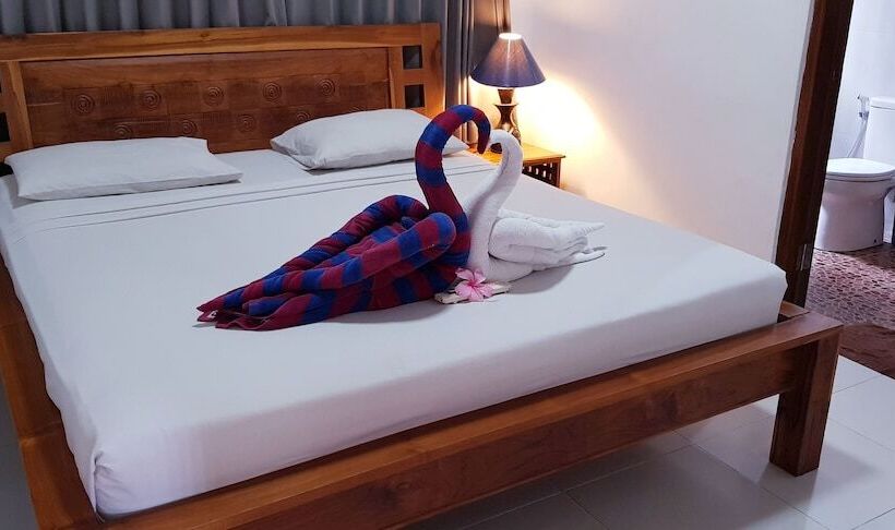 חדר משפחתי, Kusnadi