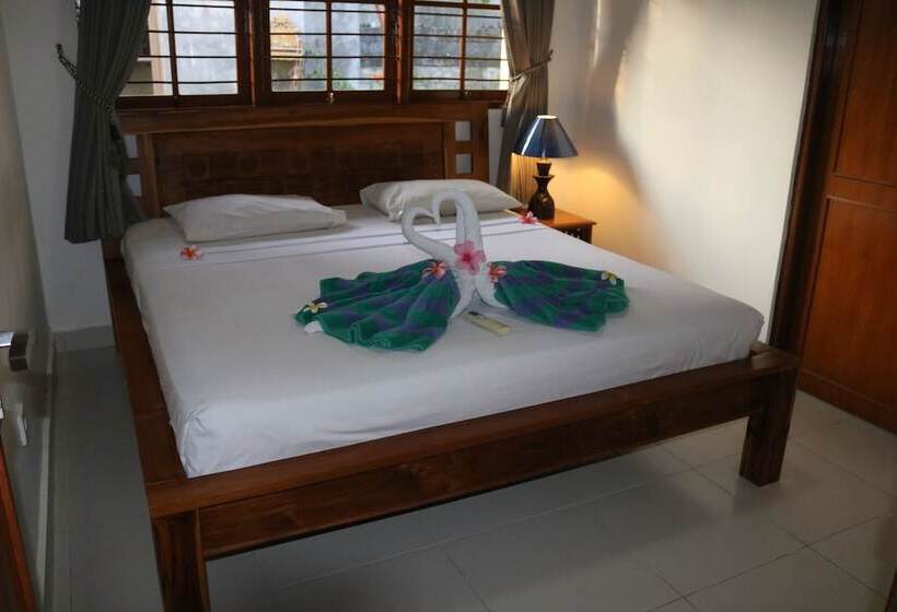 חדר משפחתי, Kusnadi