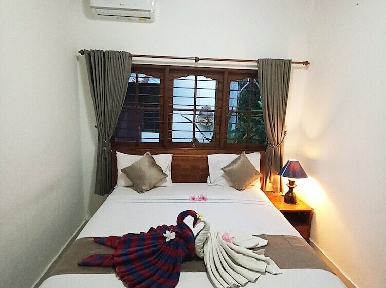 חדר משפחתי, Kusnadi