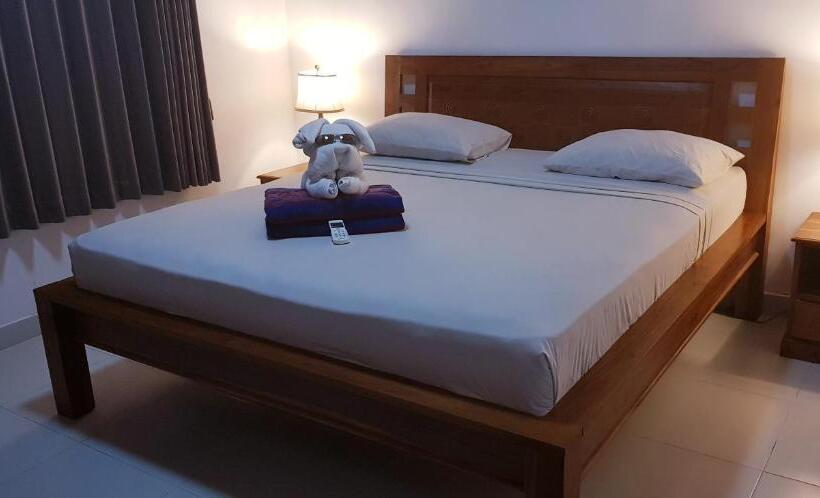 חדר משפחתי, Kusnadi