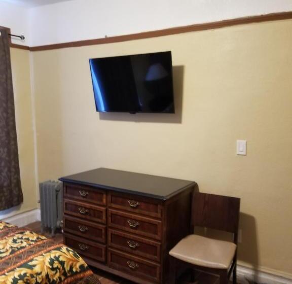 חדר סטנדרד יחיד חדר אמבטיה משותף, Page