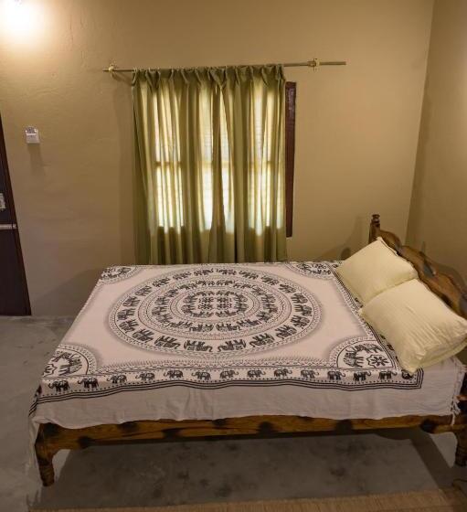 Quarto Deluxe, Tharu Community Lodge