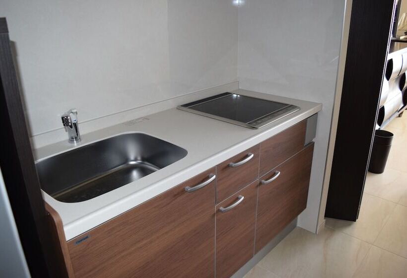 חדר דלוקס לארבעה, Wisteria Condominium Resort