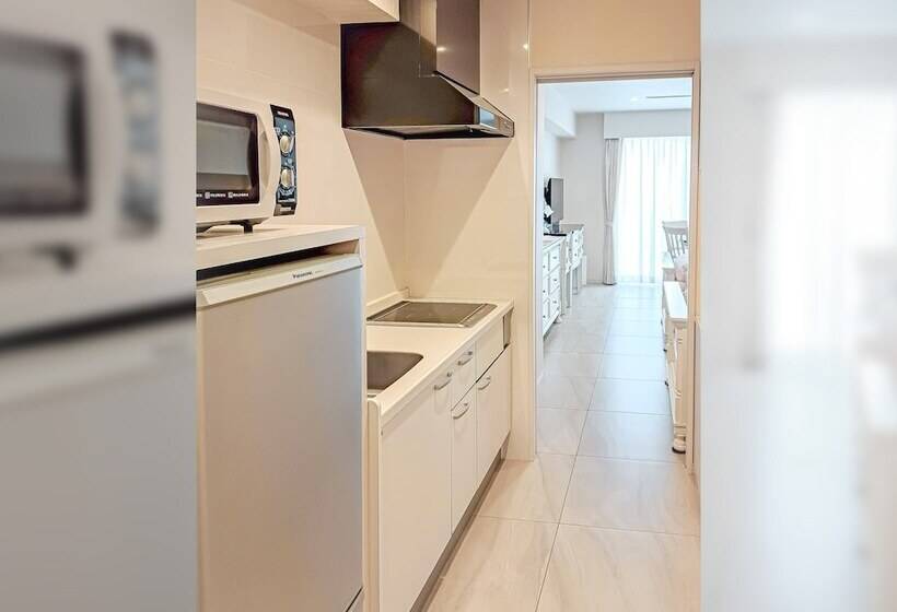 חדר דלוקס לארבעה, Wisteria Condominium Resort