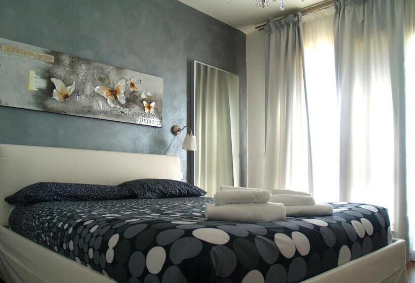 اتاق استاندارد سه تخته با چشم‌انداز باغ, Cameracaffe Sul Lago