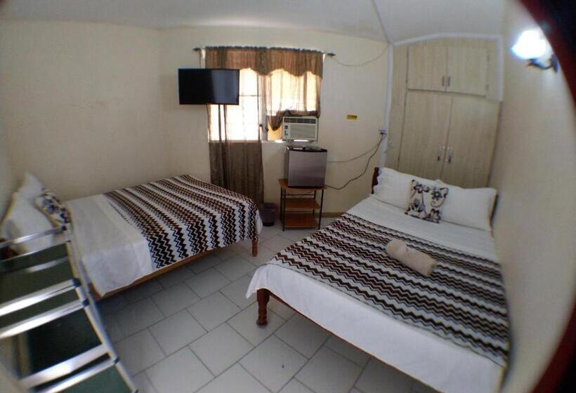 غرفة إقتصادية, The Red Hut Inn