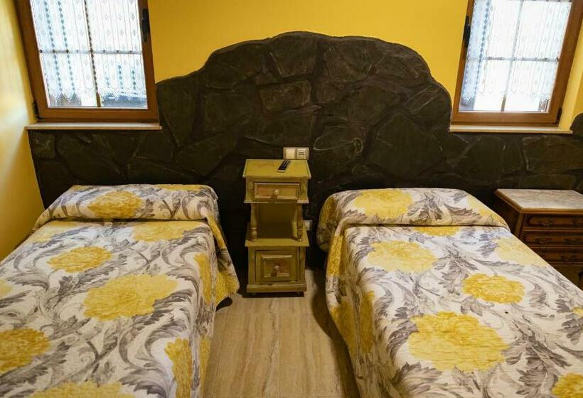 ベーシックルーム, Un Lugar En La Vecilla