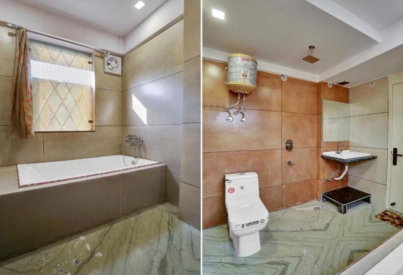 Quarto Triplo Clássico, Oyo Flagship 81202 Brown Villa