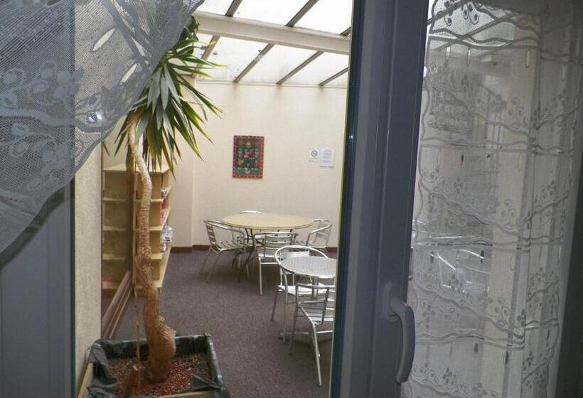 经济房, Hôtel Du Commerce