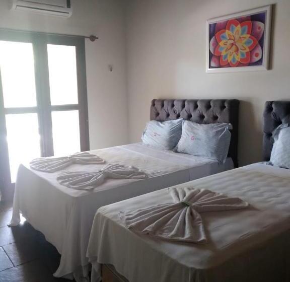 חדר דלוקס לשלושה, Praia Da Paixão