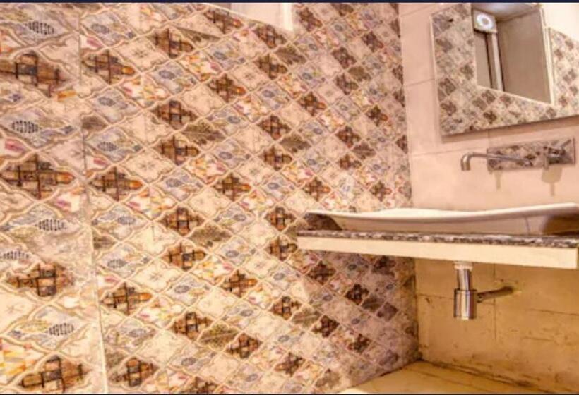 חדר דלוקס, Grand