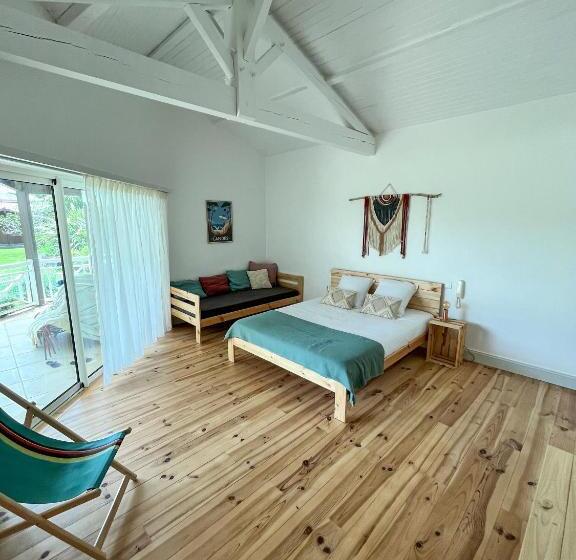 חדר סטנדרט לשלושה עם נוף לגינה, La Villa Des 3 Pins