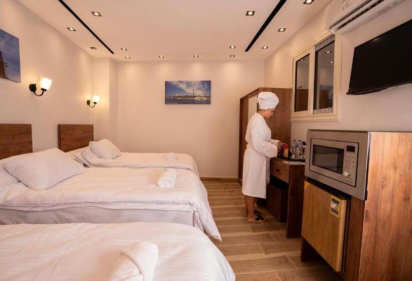 اتاق لوکس سه تخته, Sun And Sand Guest House