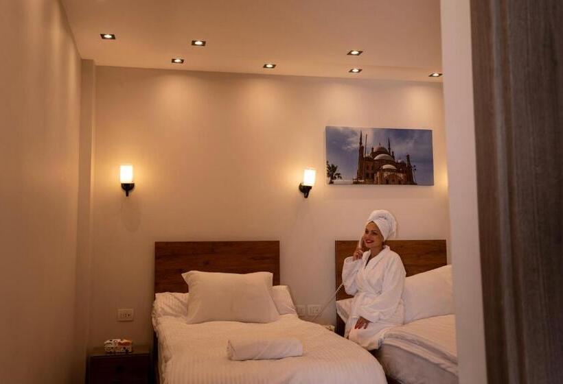 اتاق لوکس سه تخته, Sun And Sand Guest House