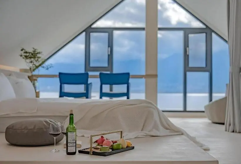キングサイズベッドのデラックスルーム, Dali Oriental Seaview Hotel  Dali Erhai