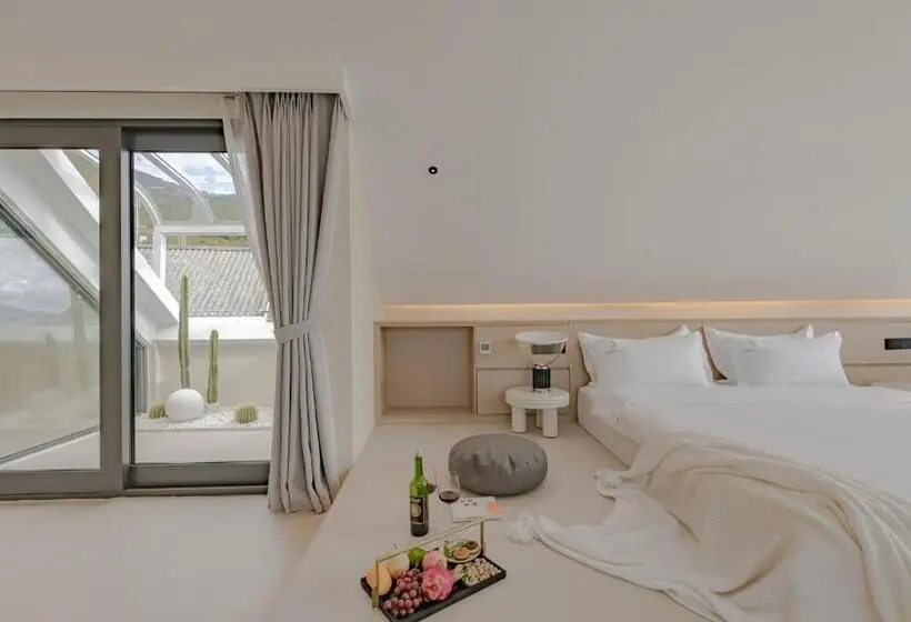 キングサイズベッドのデラックスルーム, Dali Oriental Seaview Hotel  Dali Erhai