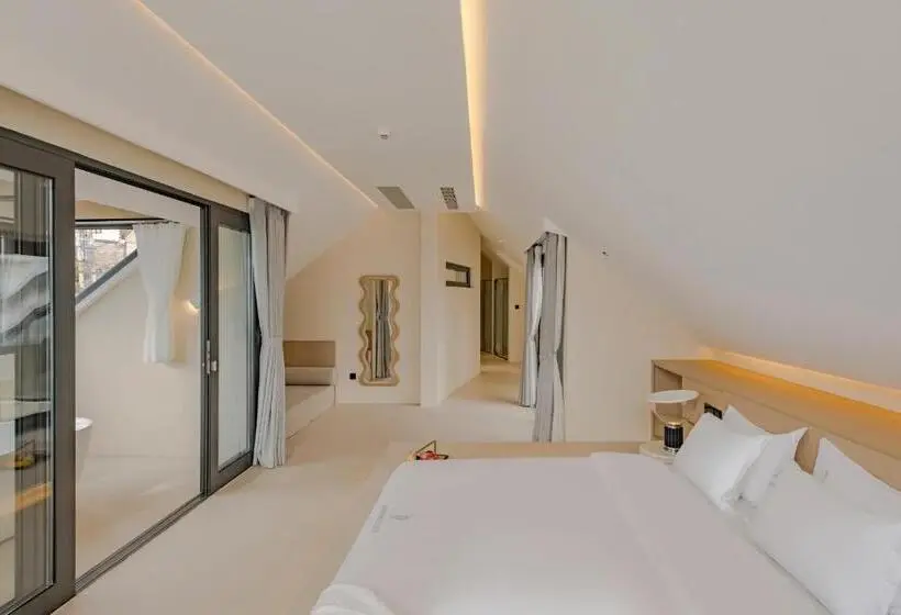 キングサイズベッドのデラックスルーム, Dali Oriental Seaview Hotel  Dali Erhai