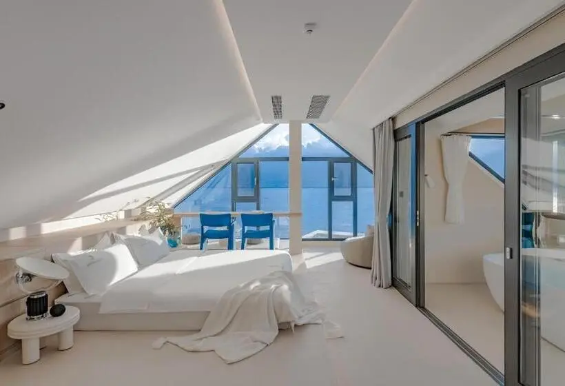 キングサイズベッドのデラックスルーム, Dali Oriental Seaview Hotel  Dali Erhai