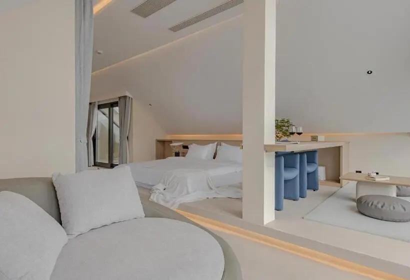 キングサイズベッドのデラックスルーム, Dali Oriental Seaview Hotel  Dali Erhai