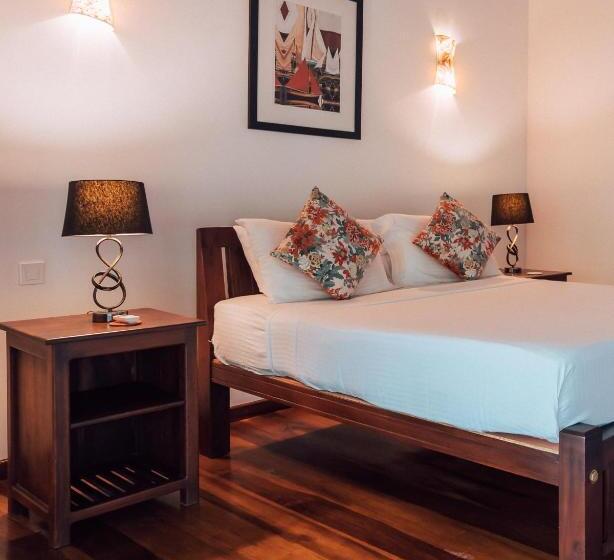 جناح جونيور مطل على الحديقة, Amara Villa