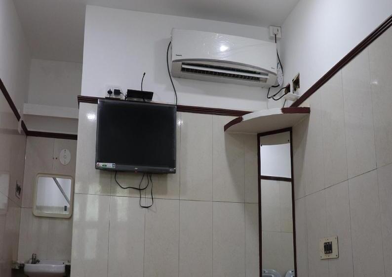 Quarto Deluxe, Clinton Guest House