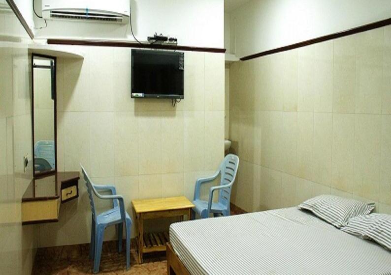 חדר דלוקס לארבעה, Clinton Guest House