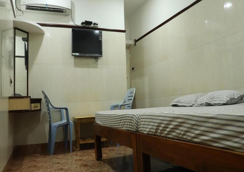 חדר דלוקס לארבעה, Clinton Guest House