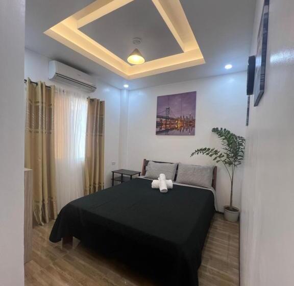 اتاق استاندارد سه تخته با چشم‌انداز باغ, Rich Vania Suites