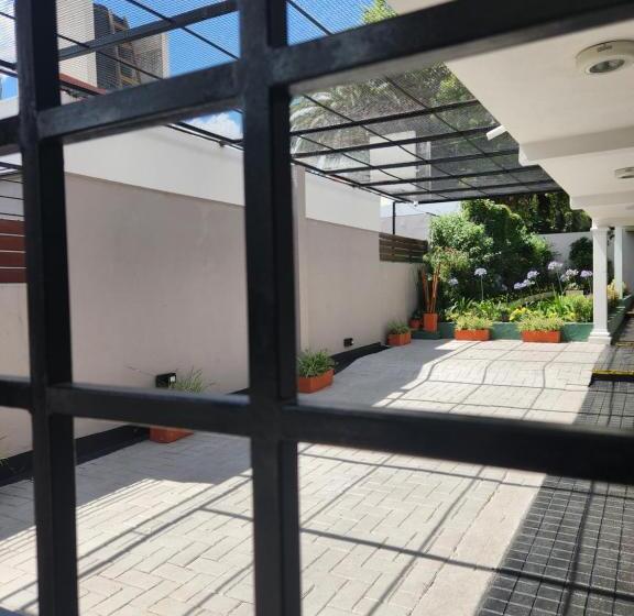 חדר לארבעה סטנדרטי עם נוף לגינה, Maktub Departamentos Y Habitaciones