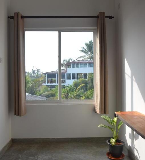 חדר דלוקס צדדי נוף לים, The Stables Hotel Midigama