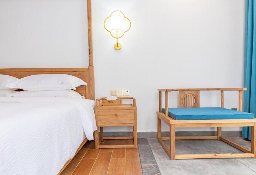 חדר סטנדרט עם מרפסת, Zhangjiajie Qiquan Vacation B&b