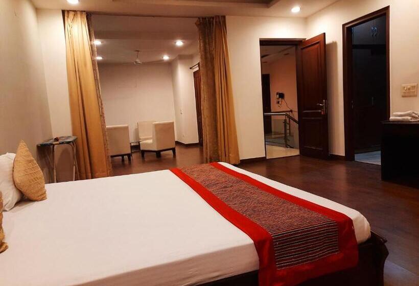 キングサイズベッドのスタンダードルーム, Manor Inn Suites Executive Suite