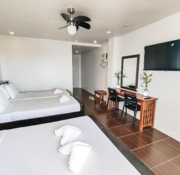 غرفة قياسية رباعية مطلة على البحر, Amboy S Hometel Official