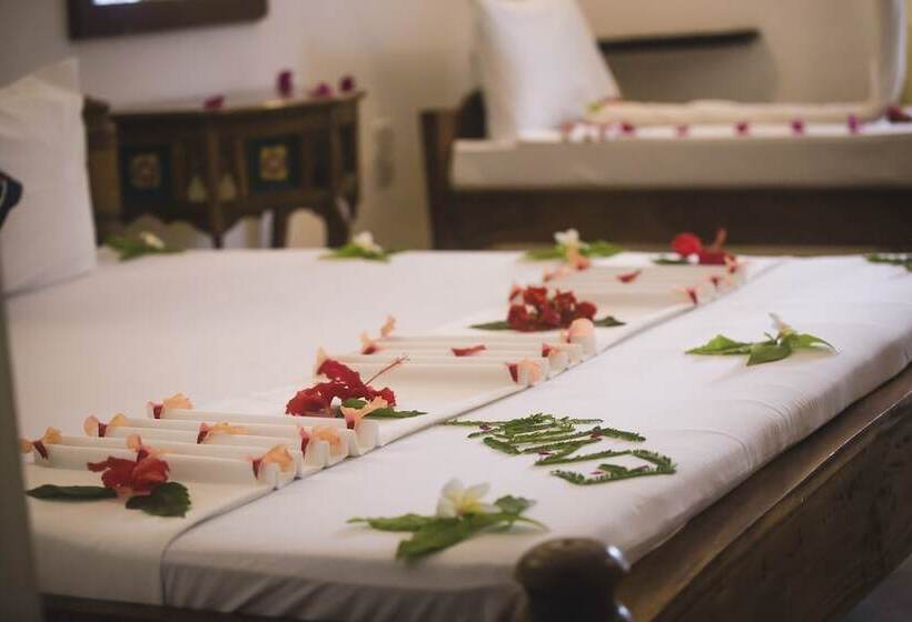 غرفة عائلية مطلّة علي البحر, Moonshine Uroa Boutique