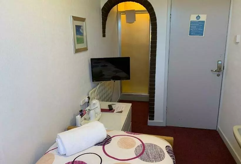 اتاق استاندارد یک تخته با سرویس بهداشتی مشترک, Austins Self Service Guest House
