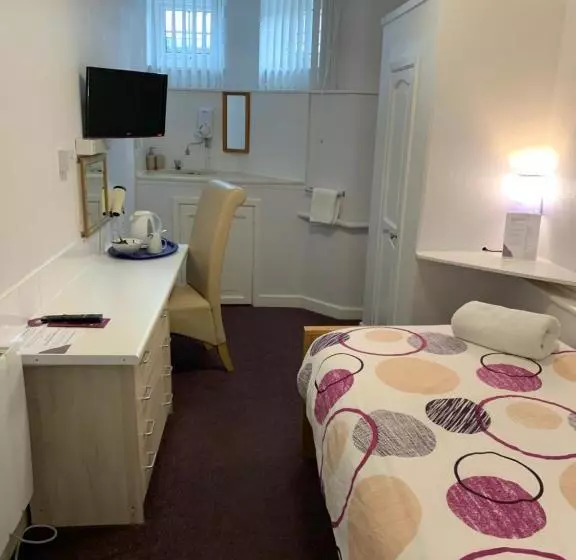 اتاق اکونومی یک تخته, Austins Self Service Guest House