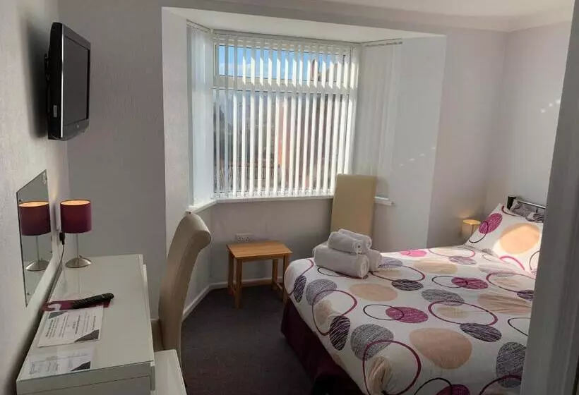 استودیوی لوکس, Austins Self Service Guest House