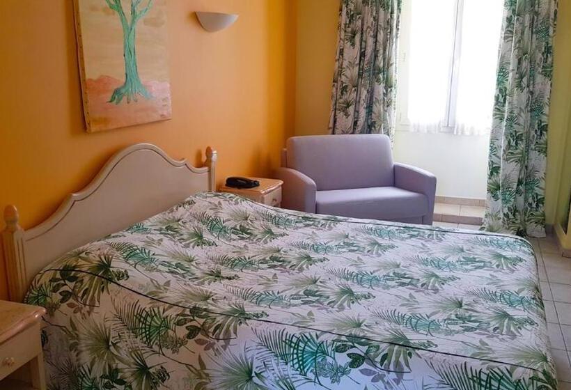 Quarto Deluxe, Hôtel Les Palmiers