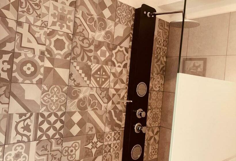 חדר משפחתי, Hôtel U Passa Tempu