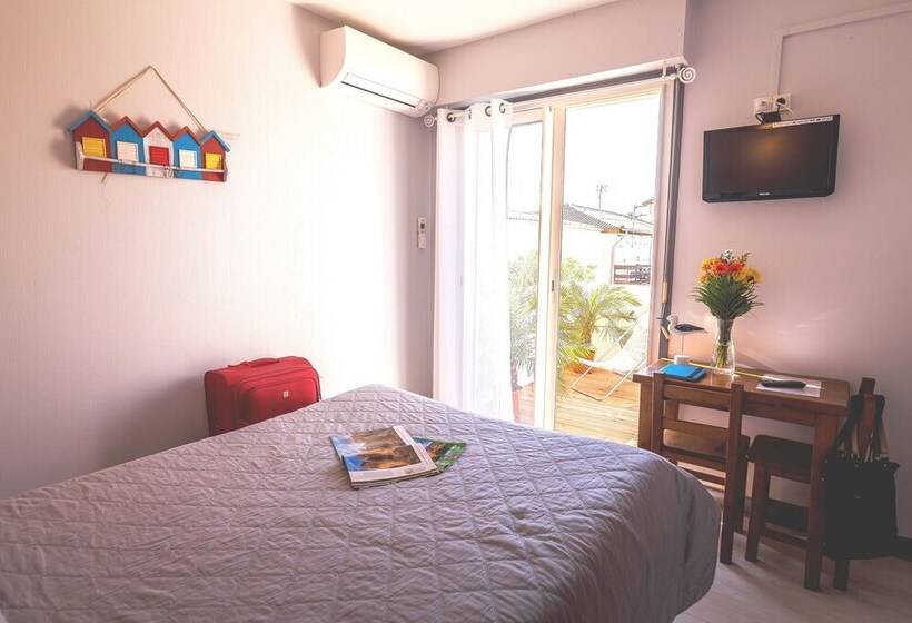 غرفة عائلية, De La Plage