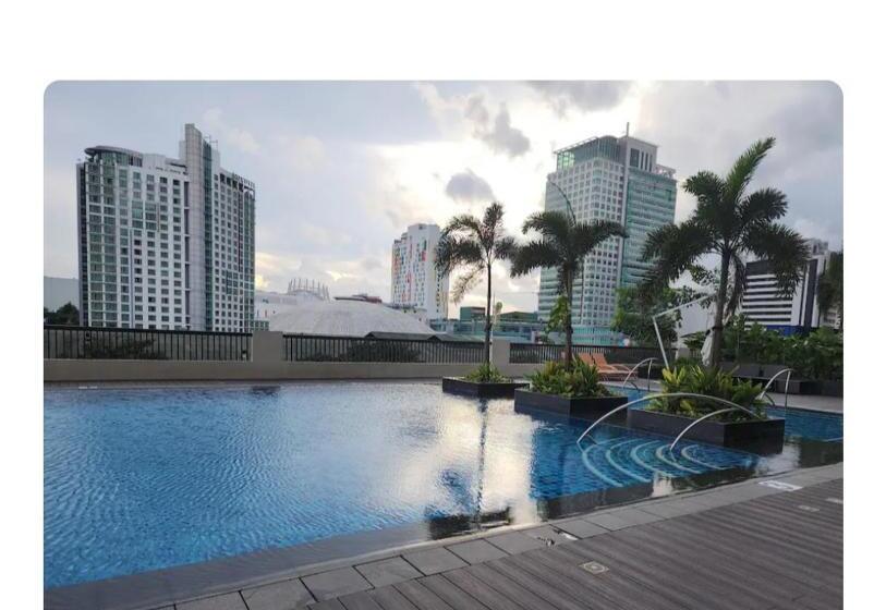 Апартаменты 1 Спальня с Балконом, Dg Condotel @manhattan Plaza T2 Studio With Balcony , 50 Inch Tv And Unli Wifi @araneta Cubao Quezon