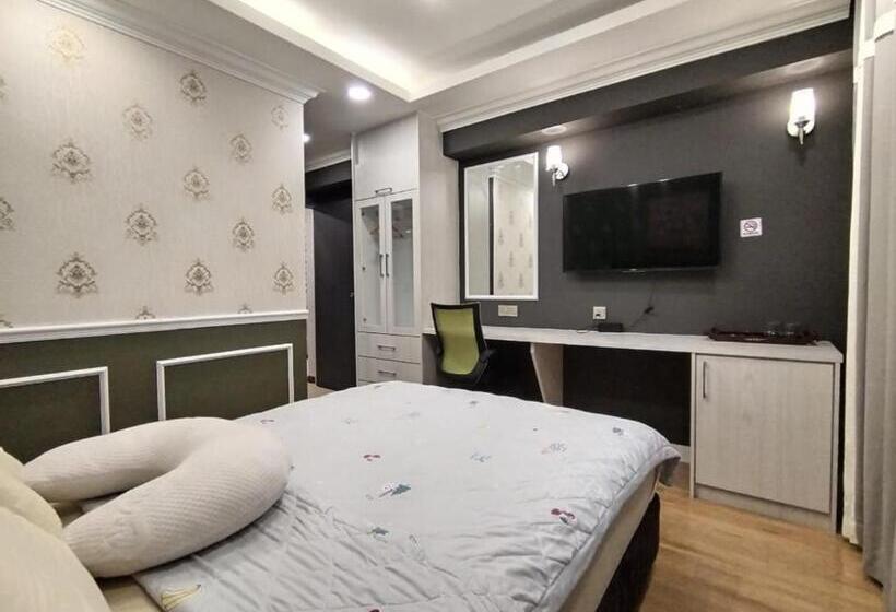 Quarto Deluxe, Grand Illusyin