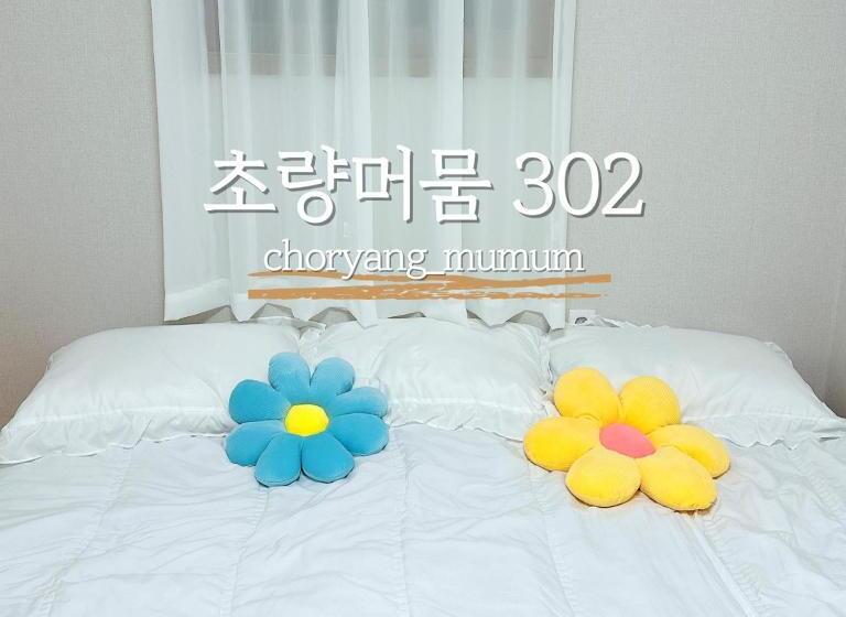 Camera Tripla Standard, Choryang Mumum 202