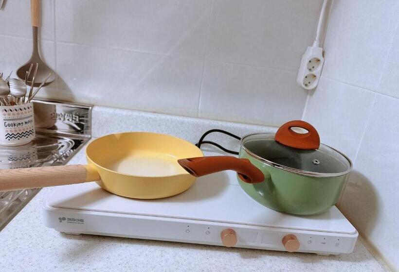 Camera Tripla Standard, Choryang Mumum 202