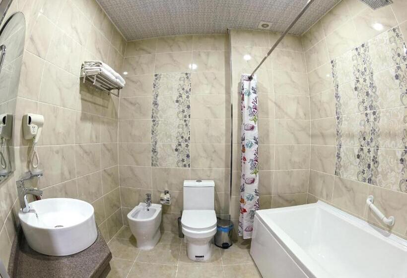 غرفة ديلوكس ثلاثية, Caravan Plaza Boutique